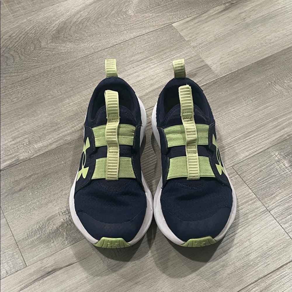 Youth size 4, Under Armour Kids' Navy and Neon Green slip on Sneakers